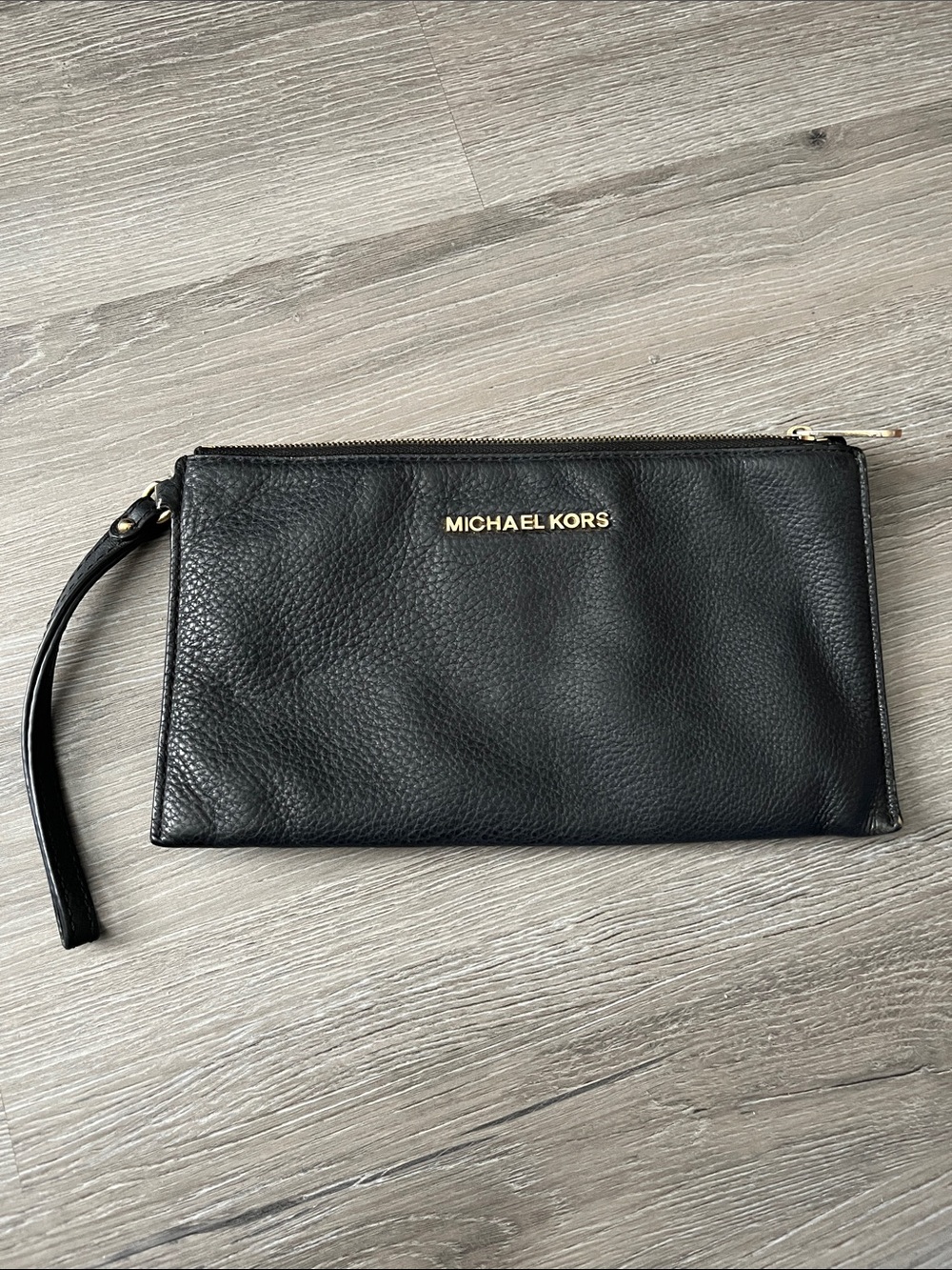 Michael Kors Black Heavy Leather clutch with Gold-look Logo